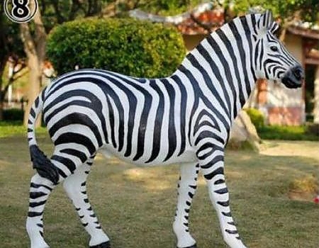 Zebra statue used in a birthday party setup