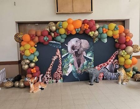 Balloon arch with animal decor at a Bay Area event
