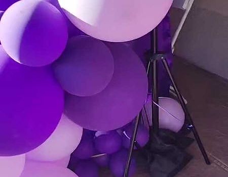 Purple and white balloons arranged for party in Bay Area